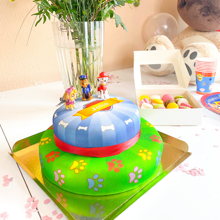 Chase and Marshall from PAW Patrol® on a two-tier dog hero cake