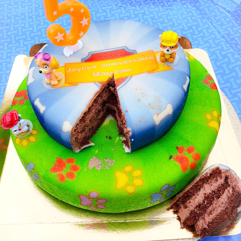 Chase and Marshall from PAW Patrol® on a two-tier dog hero cake