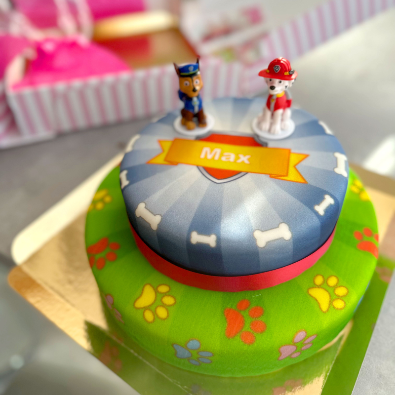 Chase and Marshall from PAW Patrol® on a two-tier dog hero cake