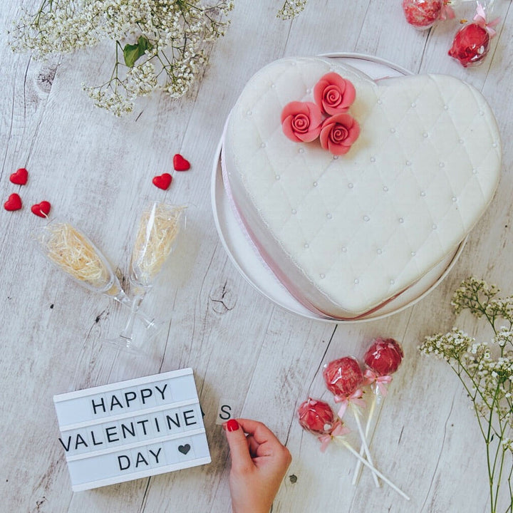 White Deluxe Valentine’s Day cake in heart shape – double height