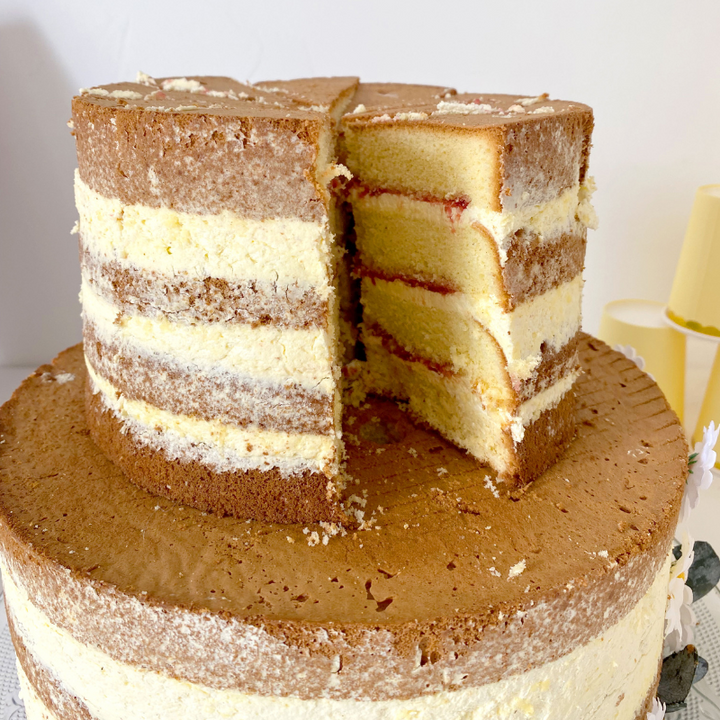 Three-tier naked cake – vanilla/raspberry