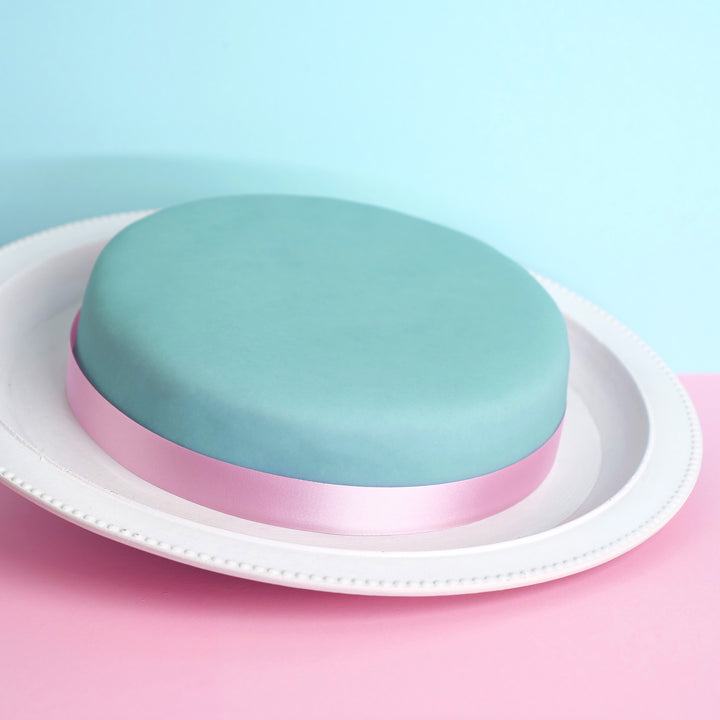 Blue cake with cake ribbon