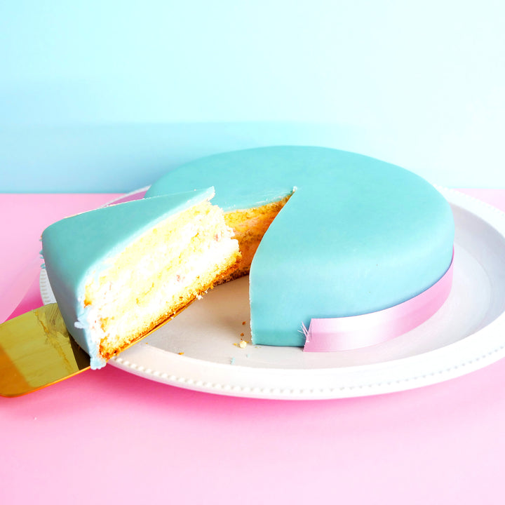 Blue cake with cake ribbon