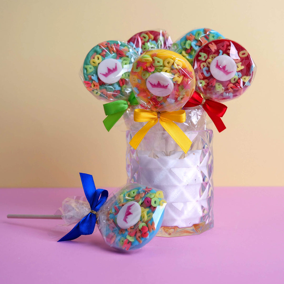 Colourful letter lollipops with logo (10 pieces)