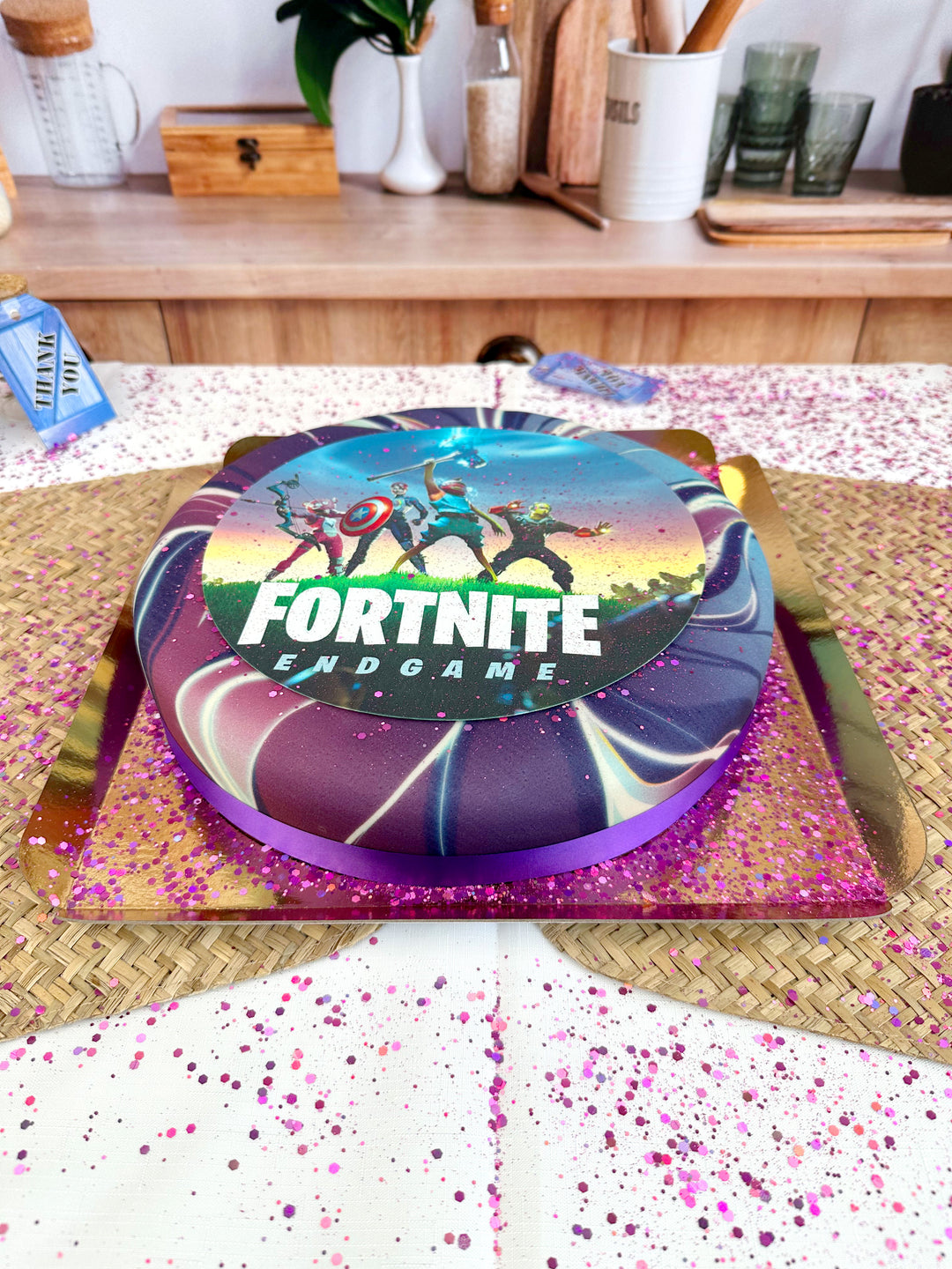 Fortnite® cake topper on Galaxy cake