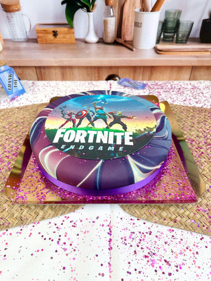 Fortnite® cake topper on Galaxy cake