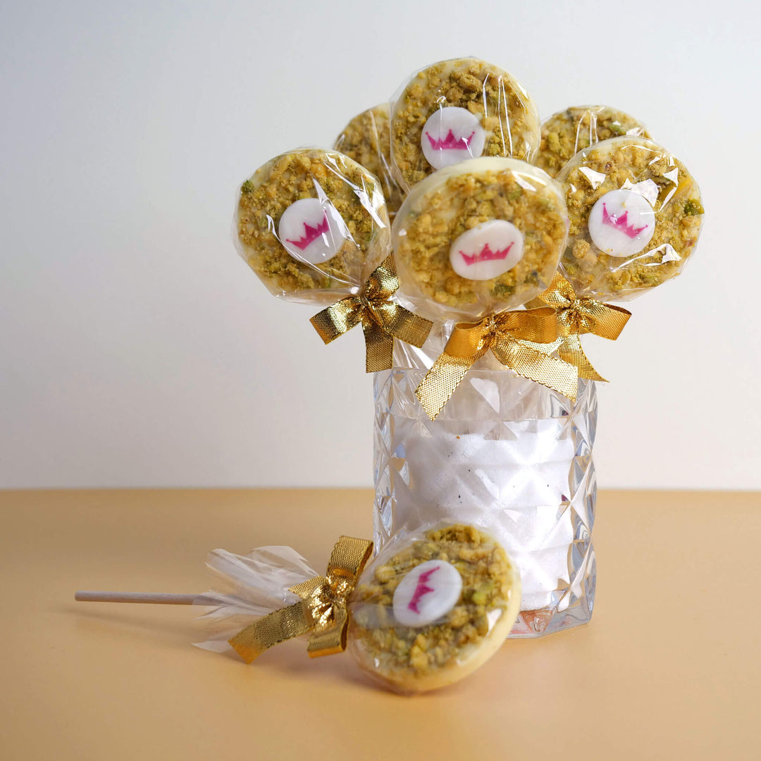 Lollipops with white chocolate & pistachios with logo (10 pieces)