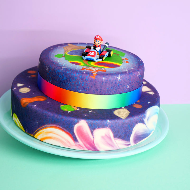 Mario Kart® on a two-tier painted planet cake