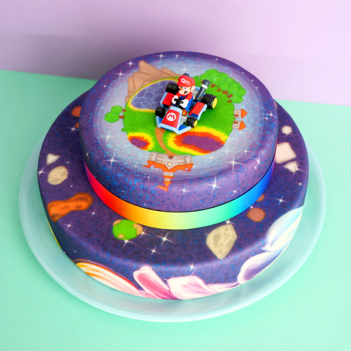 Mario Kart® on a two-tier painted planet cake