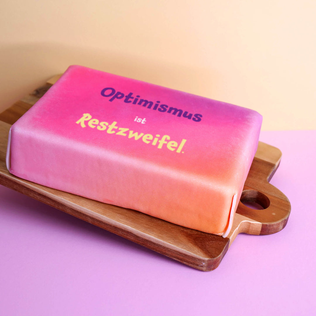 Spruch-Torte "Optimismus mit Restzweifel."
