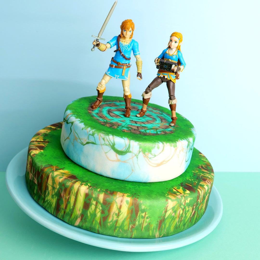 Zelda® & Link® on a two-tiered forest ruin cake