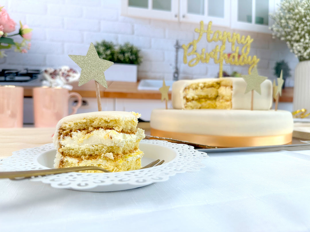 Two-tier white cake with cake ribbon