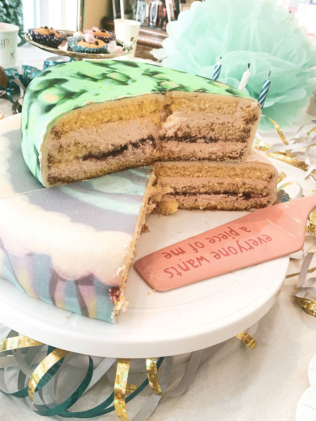 Two-tier fantasy cake with dragon figure