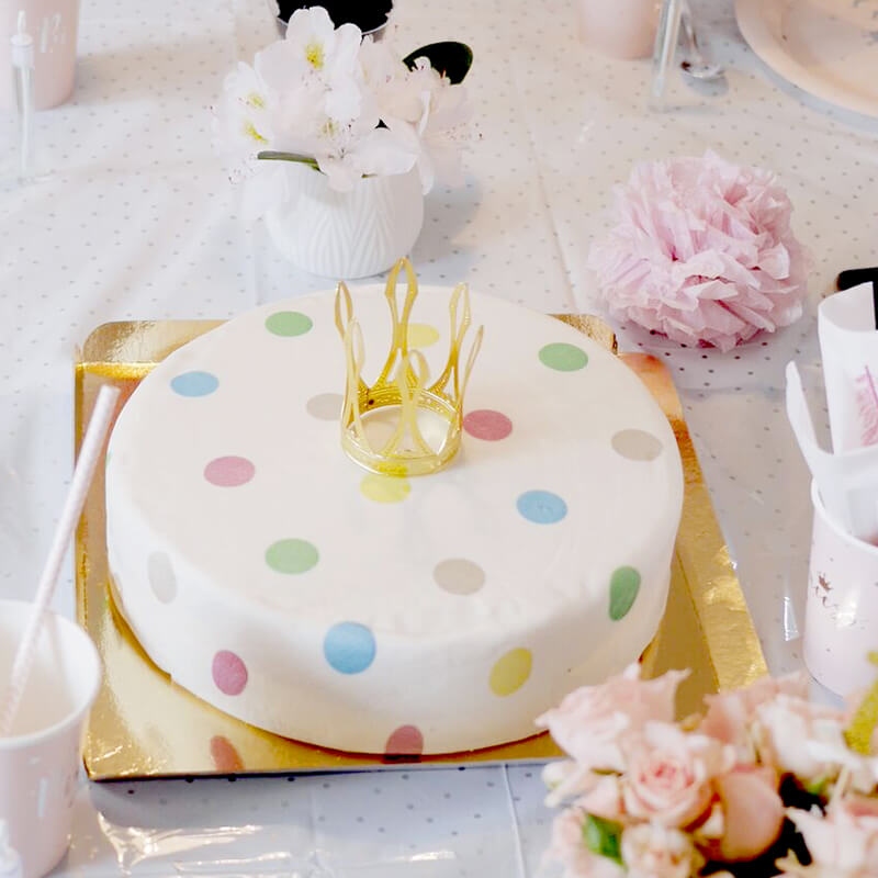White cake with pastel-coloured dots