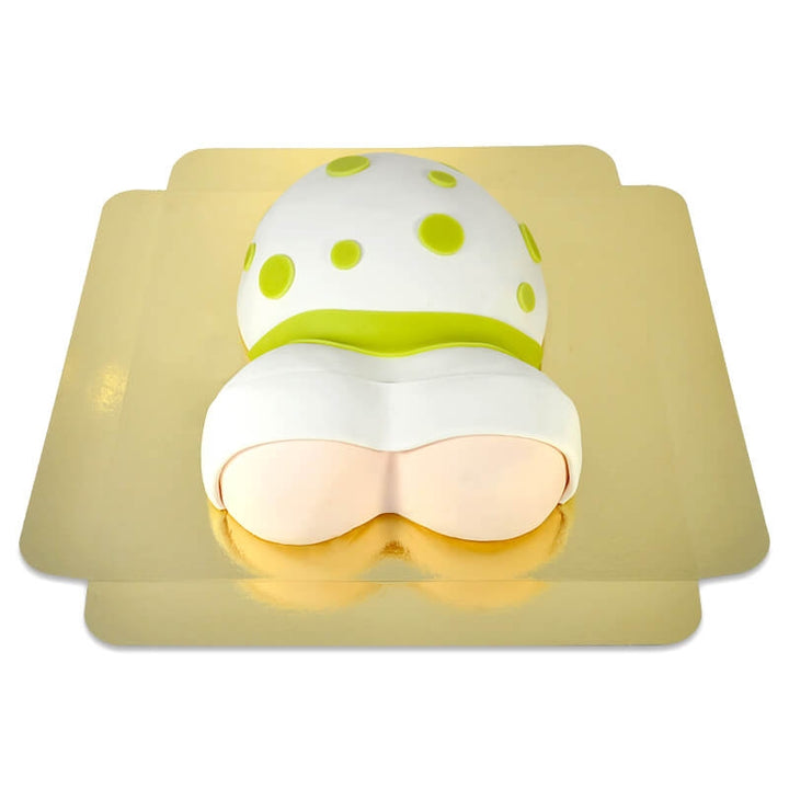 Baby bump cake with green ribbon