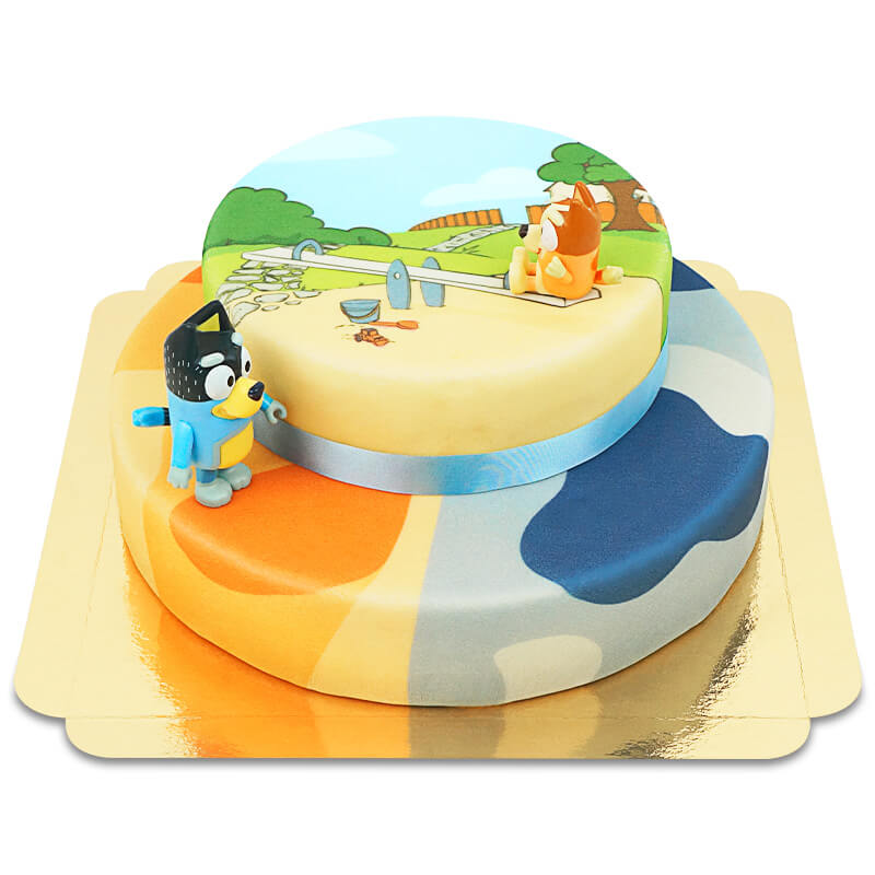 Bluey® figure on a 2-tier cake