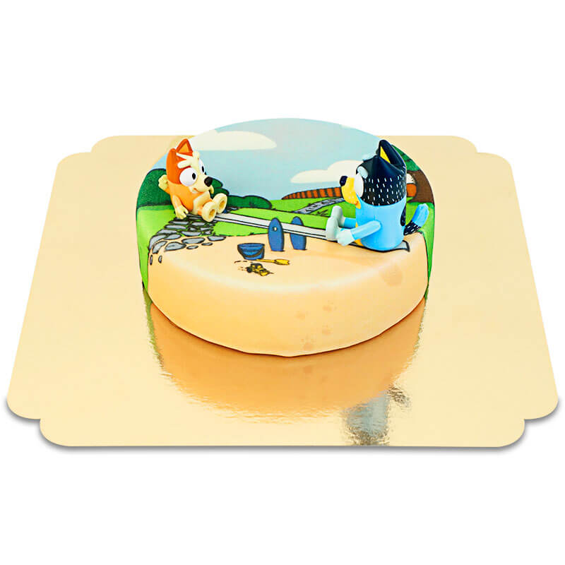 Bluey® figure on cake