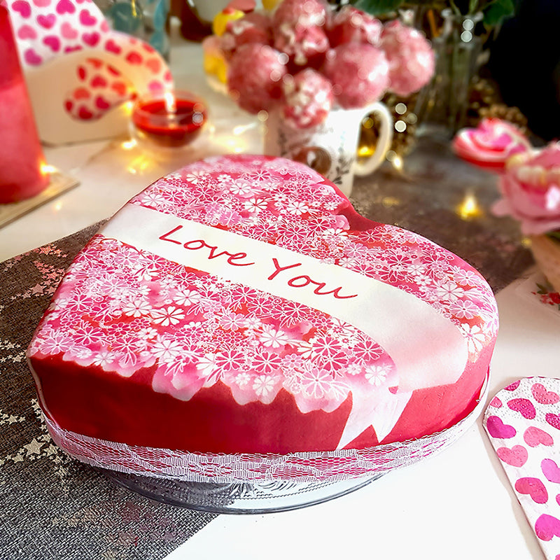 Heart-shaped love message cake