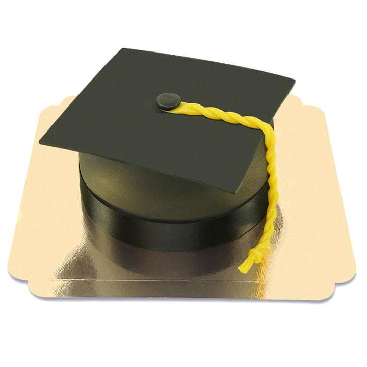 Graduation cake in the shape of a black graduation cap
