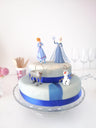 Frozen® Elsa, Anna & Olaf figures on a 2-tier snowflake cake