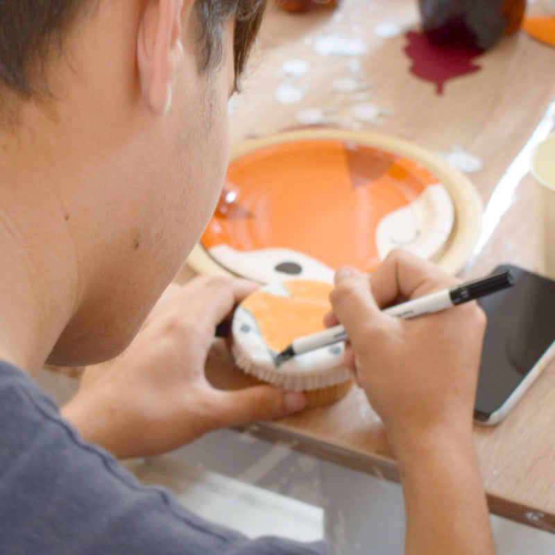 9 cupcakes with food pens