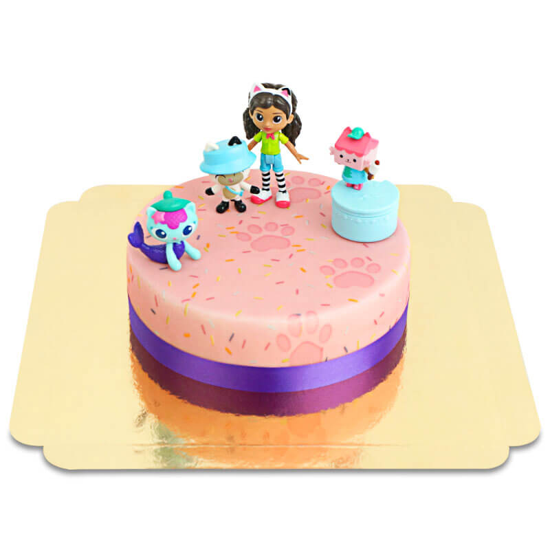 Gabby’s Dollhouse® figure on a sprinkles cake