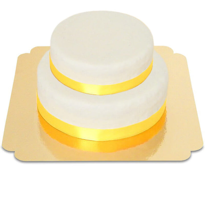 Two-tier white cake with cake ribbon