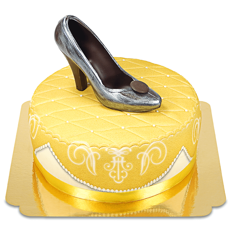 Deluxe gold cake with chocolate shoes and ribbon