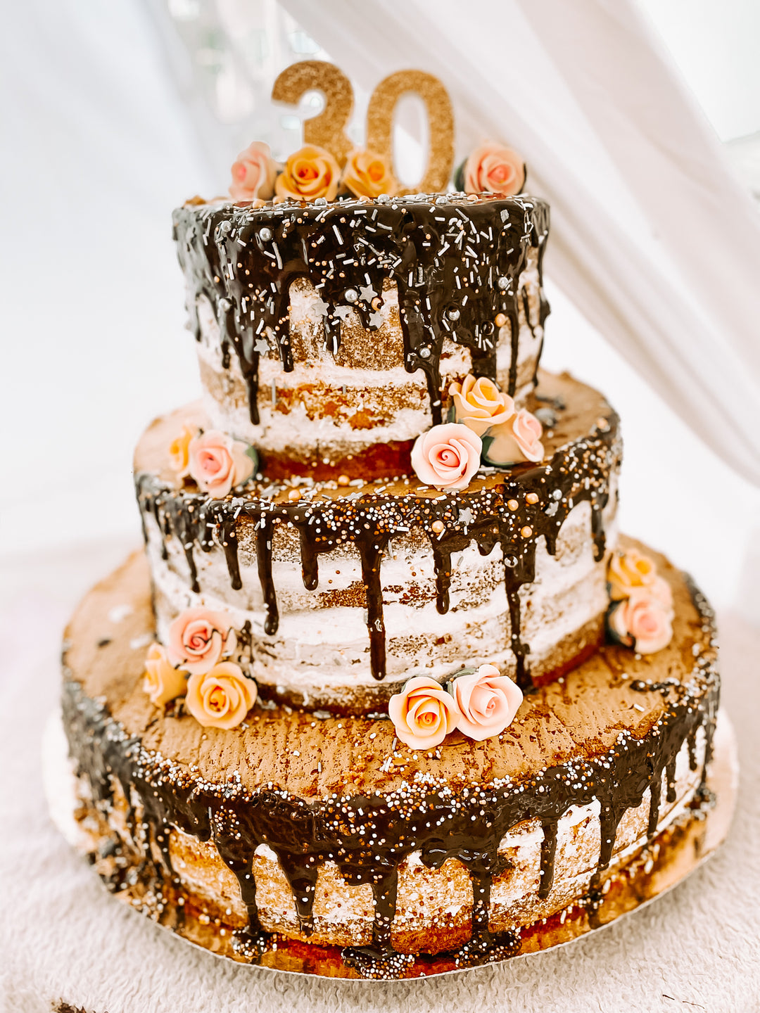 Three-tier naked cake – vanilla/raspberry