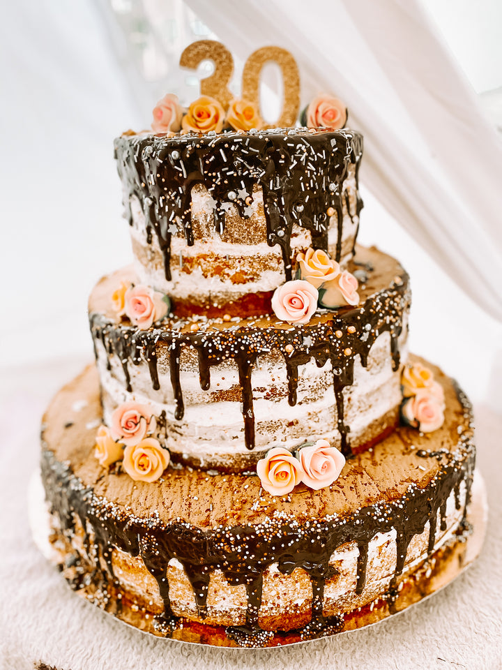Three-tier naked cake – vanilla/raspberry