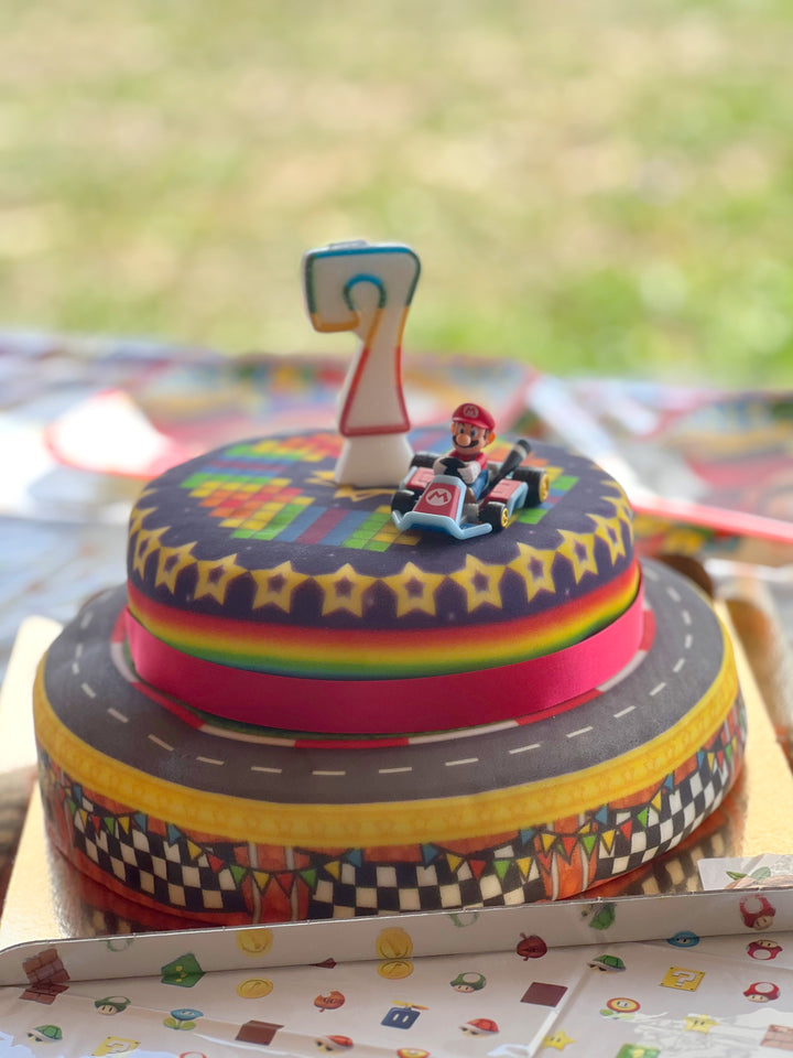 Mario Kart® on a two-tier World Circuit cake