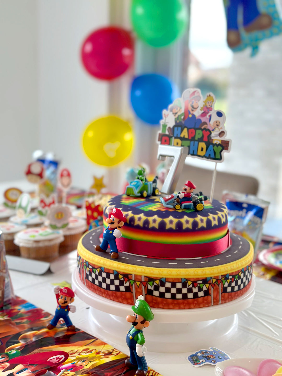 Mario Kart® on a two-tier World Circuit cake