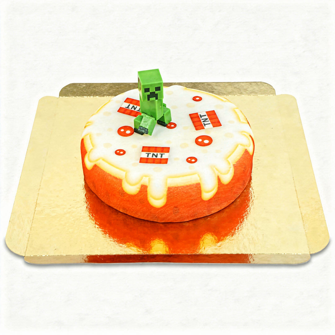 Minecraft® figure on a round TNT cake