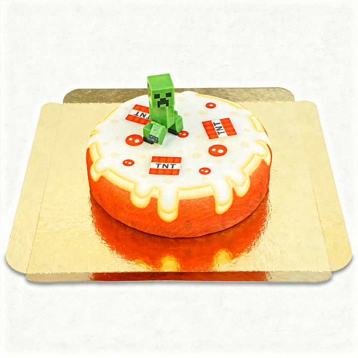 Minecraft® figure on a round TNT cake