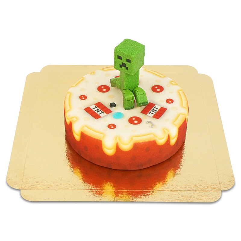 Minecraft® figure on a round TNT cake