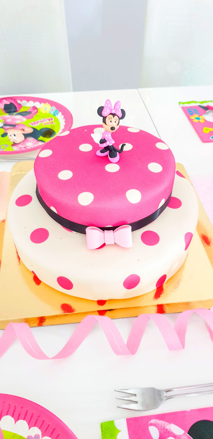 Minnie Mouse® on a 2-tier polka dot cake