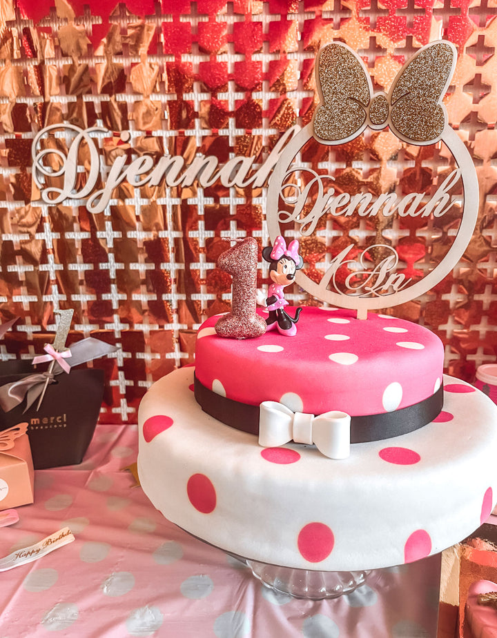 Minnie Mouse® on a 2-tier polka dot cake