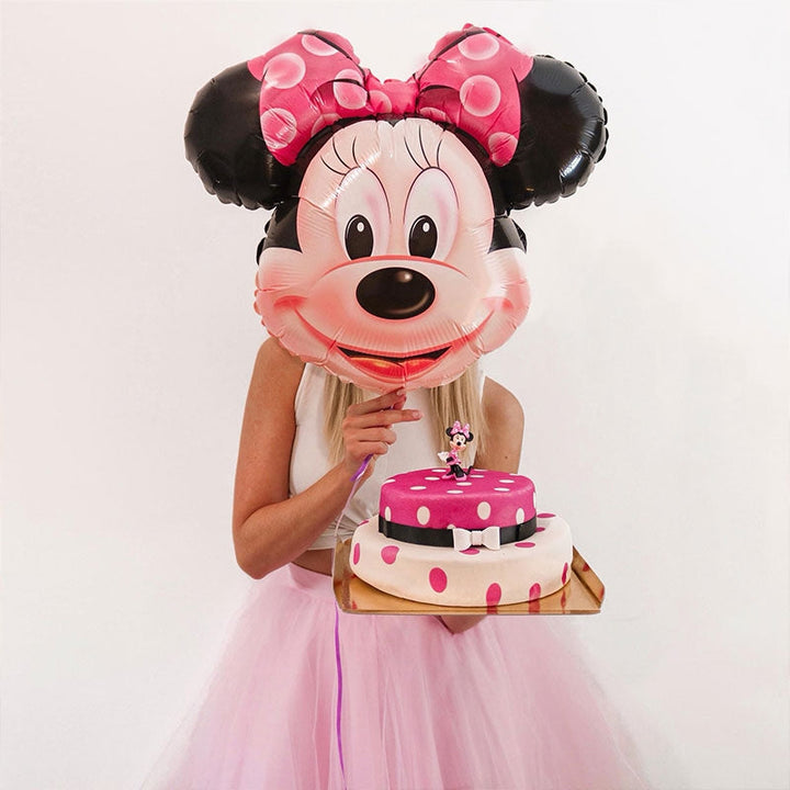 Minnie Mouse® on a 2-tier polka dot cake