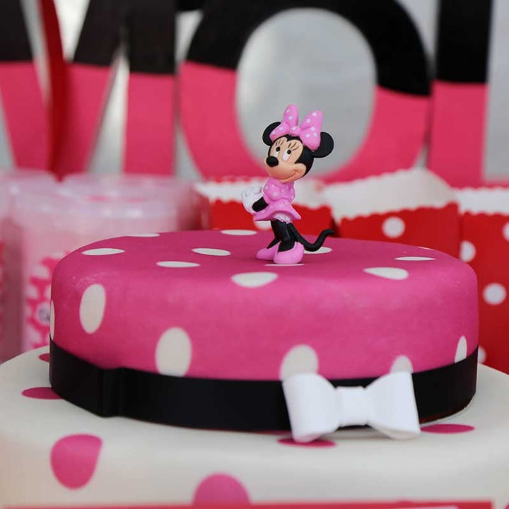 Minnie Mouse® on a 2-tier polka dot cake