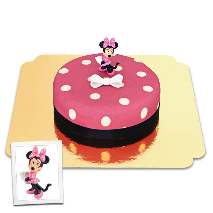Minnie® Mouse on polka dot cake with ribbon