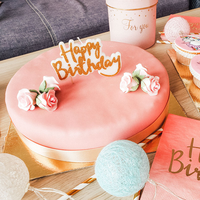 Pink cake with cake ribbon