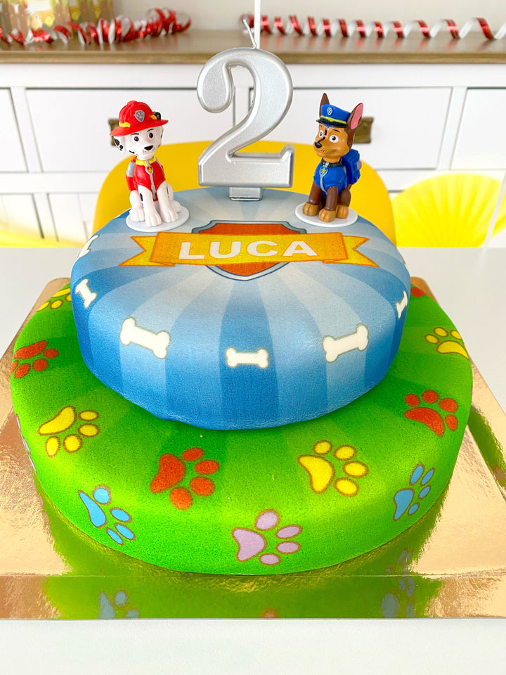 Chase and Marshall from PAW Patrol® on a two-tier dog hero cake