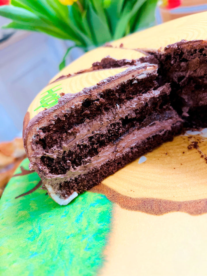 Winnie the Pooh® and Tigger on a two-tier Hundred Acre Wood cake