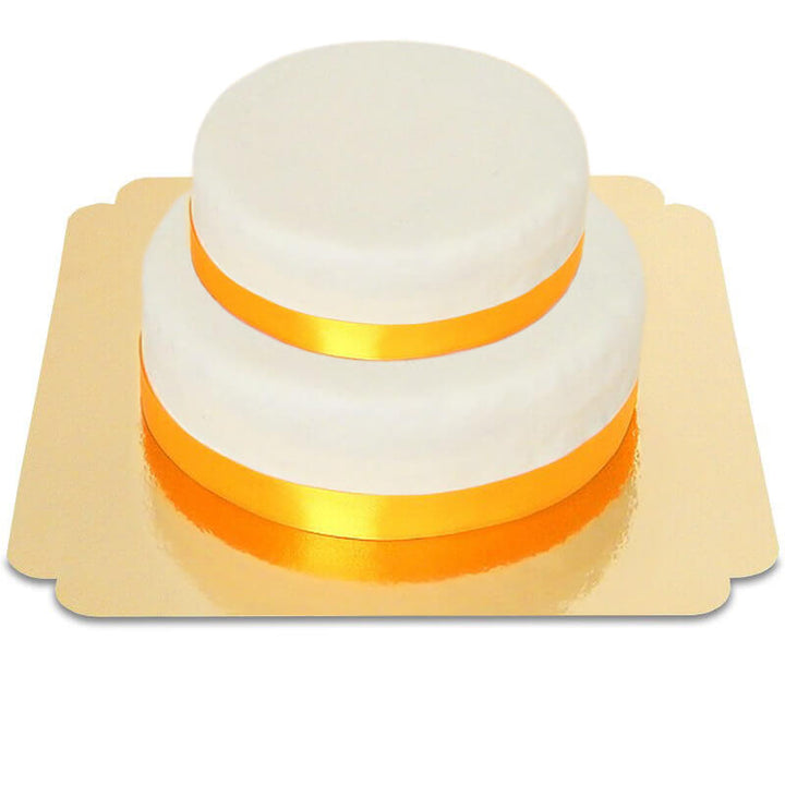 Two-tier white cake with cake ribbon