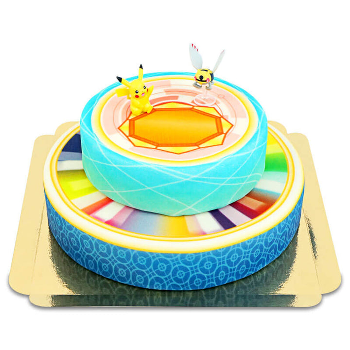 Pokémon® figure on a two-tier medal cake