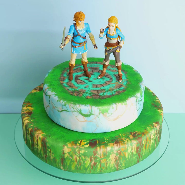 Zelda® & Link® on a two-tiered forest ruin cake