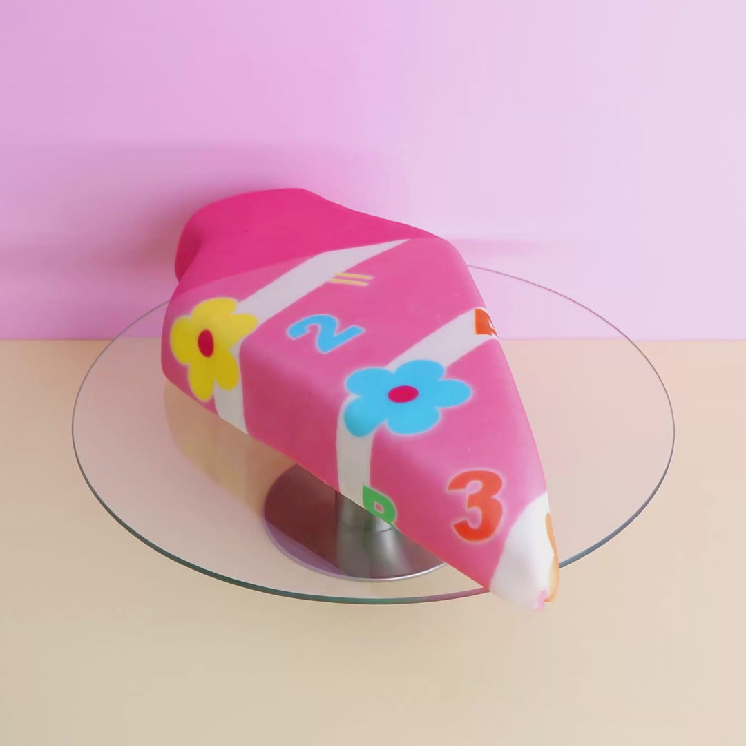 School cone cake with pink flowers