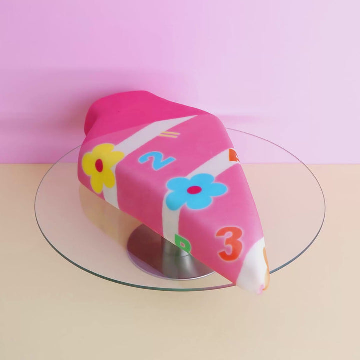 School cone cake with pink flowers