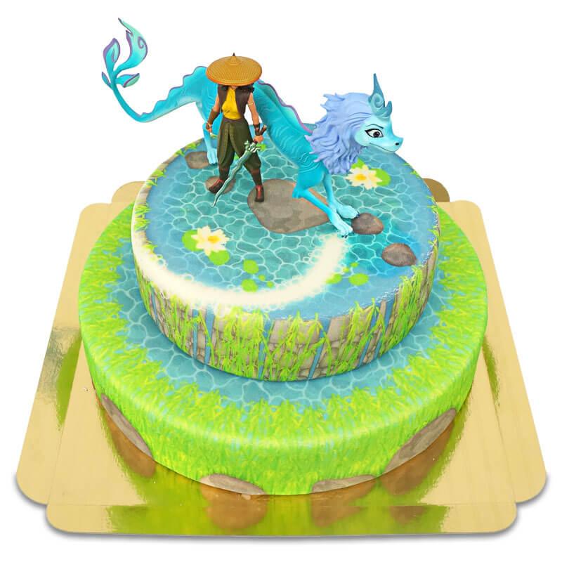 Raya and the Last Dragon® on a two-tiered magical fountain cake