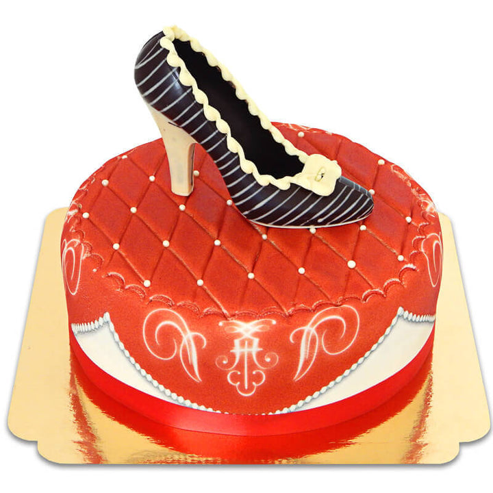 Red Deluxe Cake with Chocolate Shoe and Ribbon